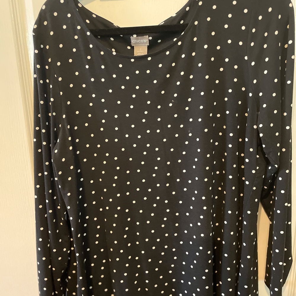 Chico’s black and white polka dot tunic with floral pleated insert in back